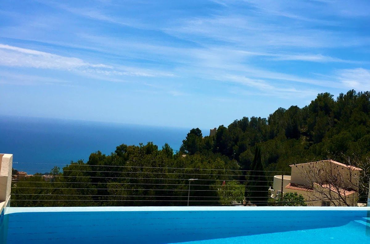 Sea-view villa terrace with infinity pool